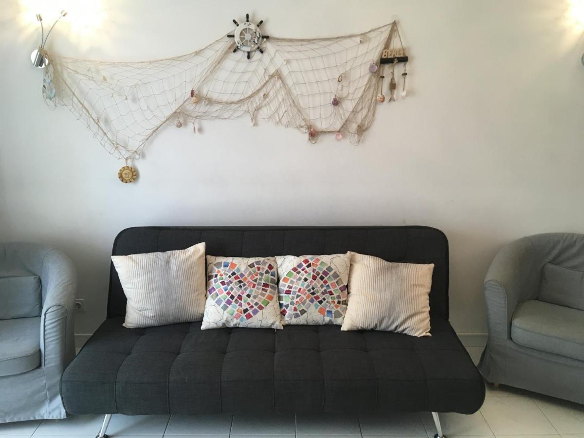 1a Atlantico - Casas & Papeis Armacao de Pera